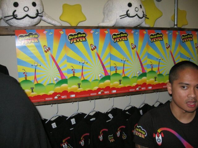 File:Promotion Wii Banner and Flipper Plushies.jpg