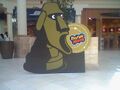 A standee featuring a Moai Kid